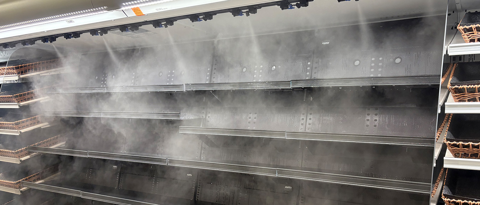 FogMist for vertical multi-shelf produce displays.