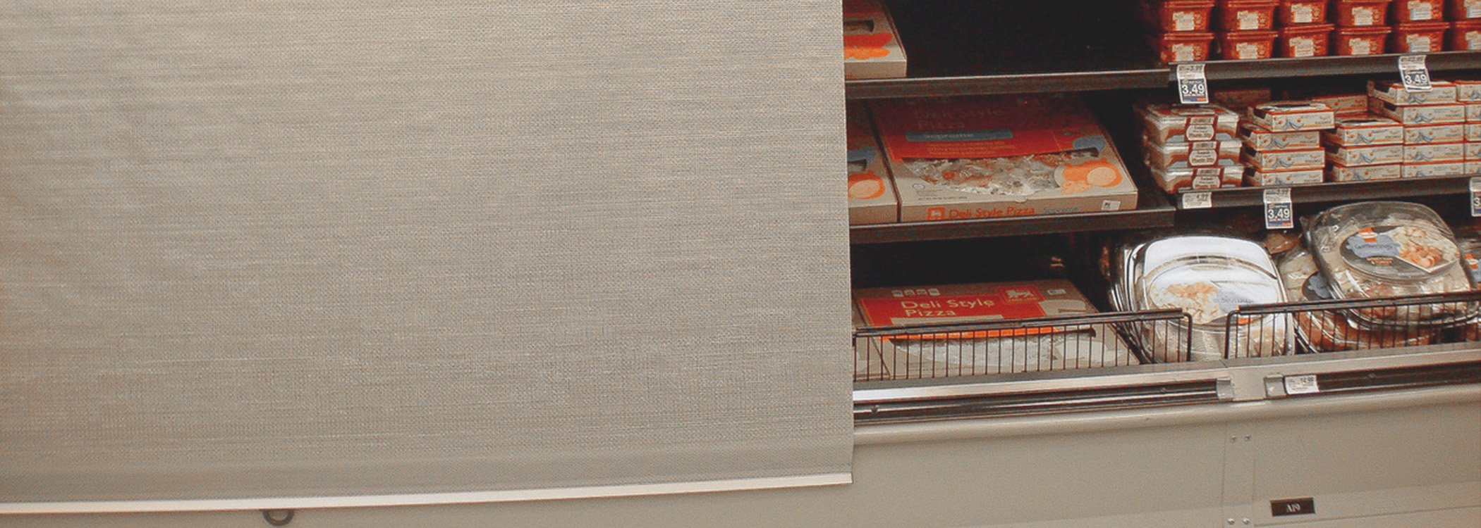Prodew Vertical Night Covers in a deli display case.